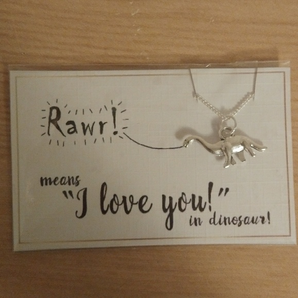 The Compton Four Jewelry - NWT Silver Tone Dinosaur Necklace